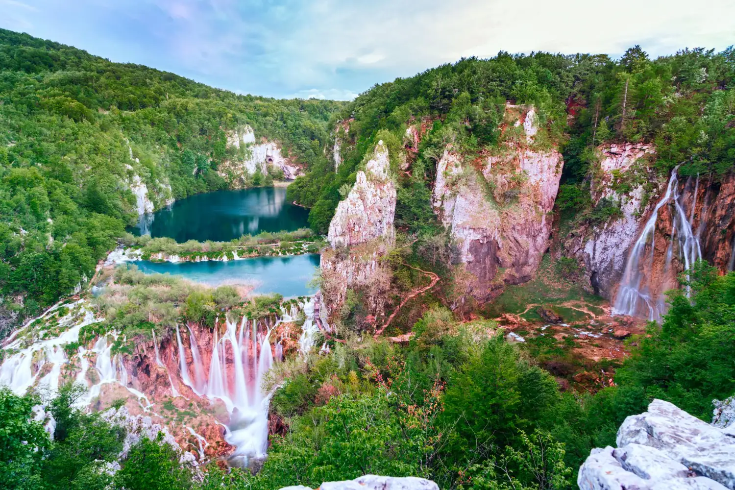 A panorama of waterfalls and lakes in Plitvice Lakes National Park.