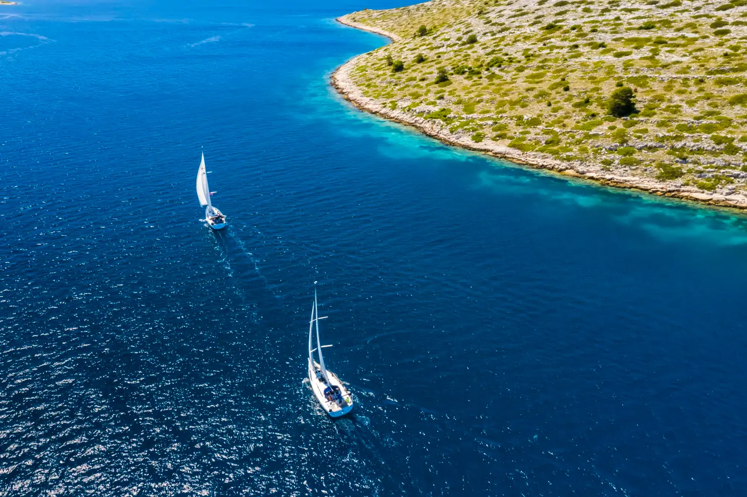 A bay in the Kornati with clear sea and rocks.
