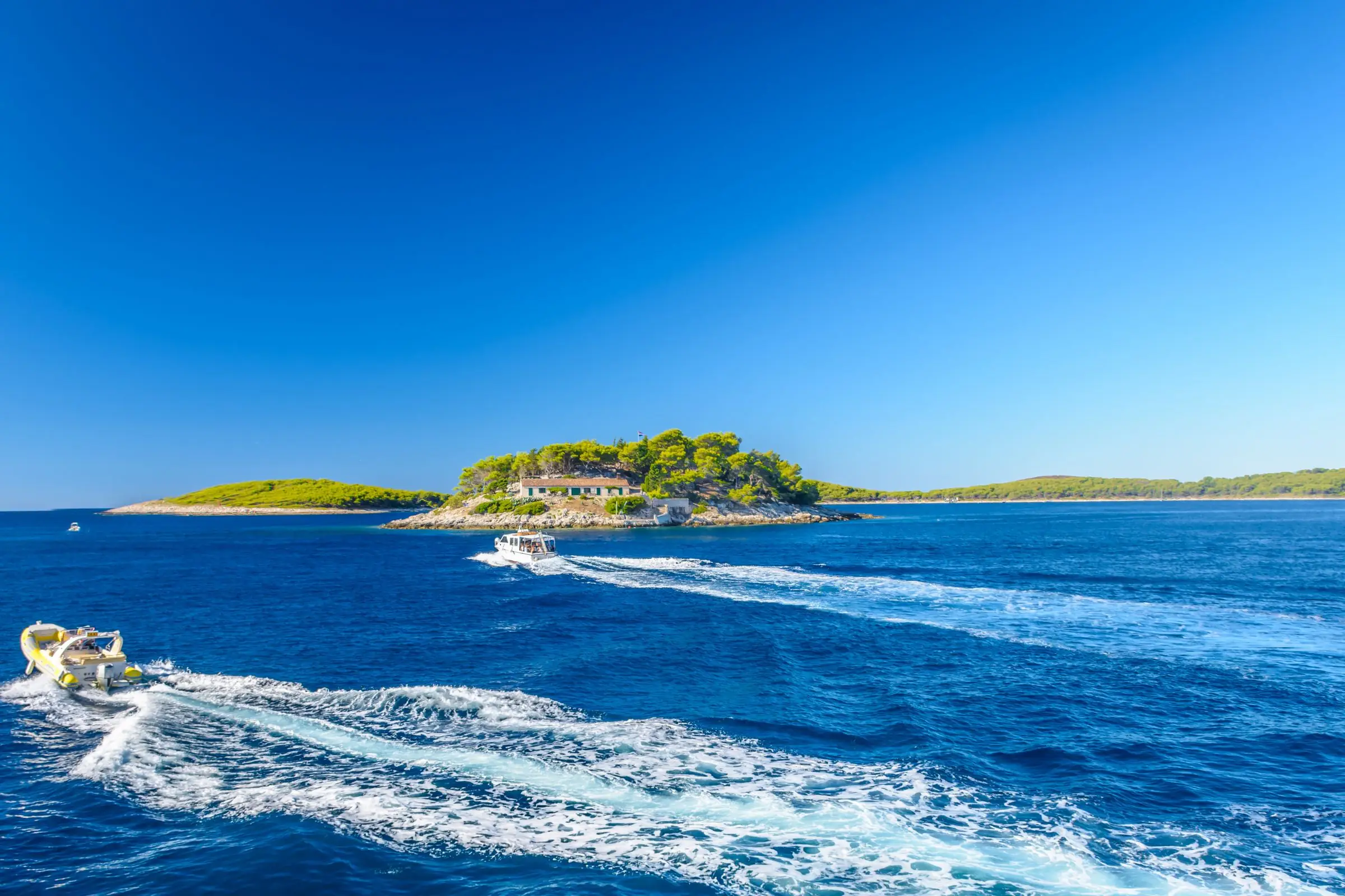 Things to do in Croatia – island-hopping by catamaran between the Dalmatian islands on turquoise sea
